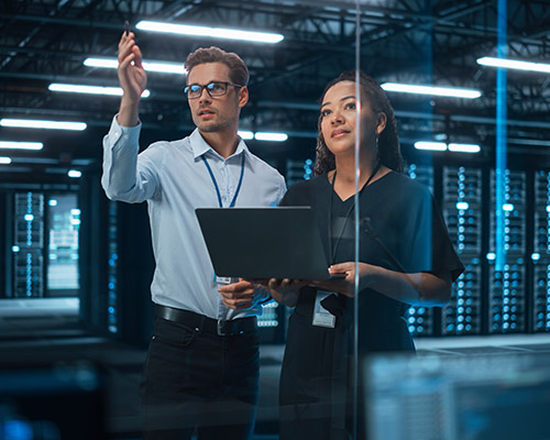 IT engineers inspecting network traffic for errors
